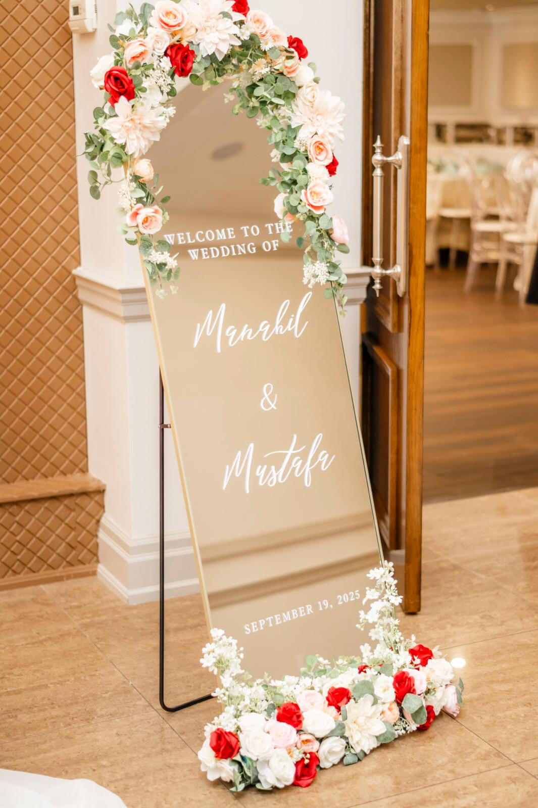 Welcome wedding mirror in Oakville A custom wedding mirror with cursive font outside a venue in Oakville.