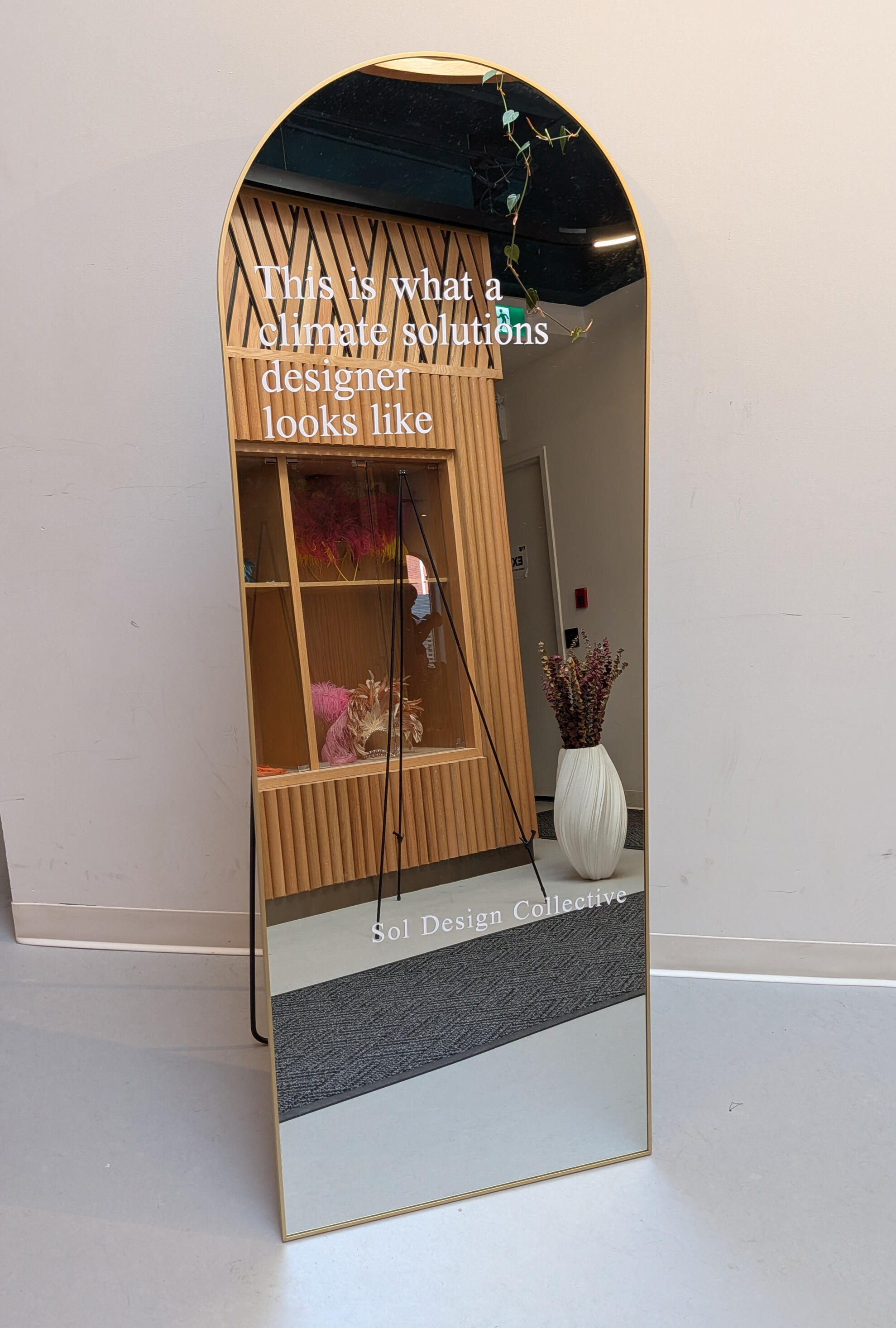 Welcome wedding mirror near entrance door in Mississauga Corporate event welcome mirror greeting guests for a full day of collaboration and learning about climate change.